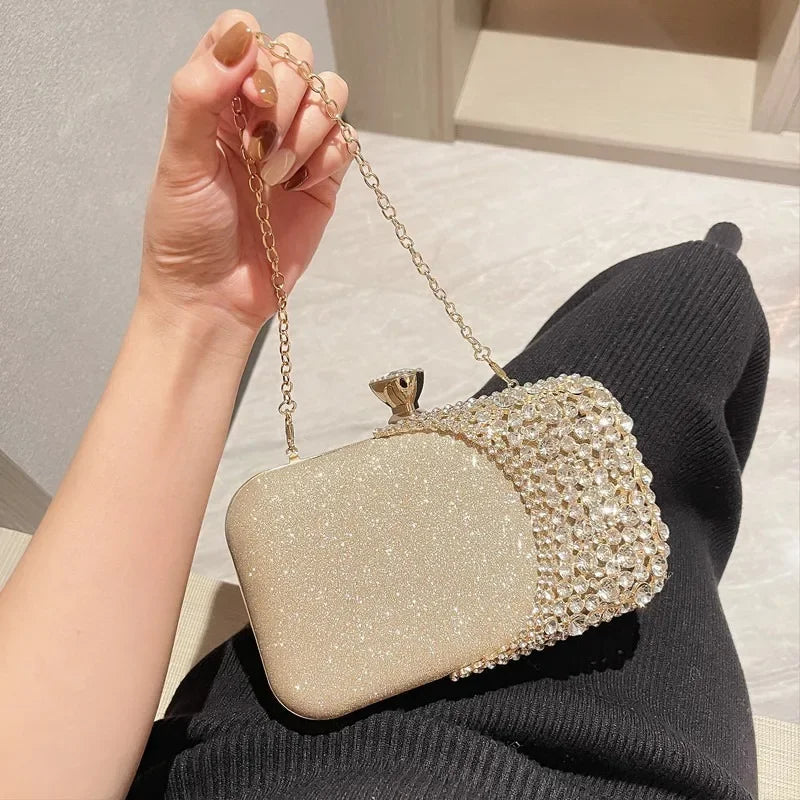 Bolsa Dourada Cravejada Velavue