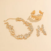 Conjunto Colar Brincos e Pulseira Irregular Dourada Velavue