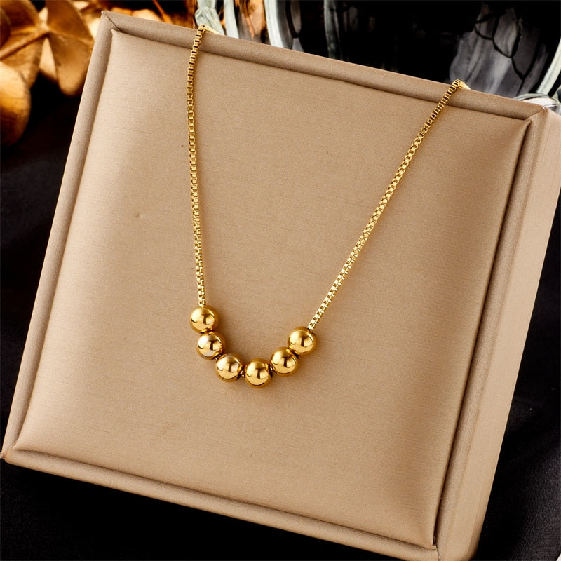 Colar Dourado com Pingente Bolas Velavue