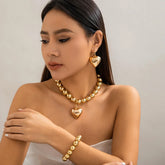 Conjunto Colar Brincos e Pulseira Coração Dourado Velavue